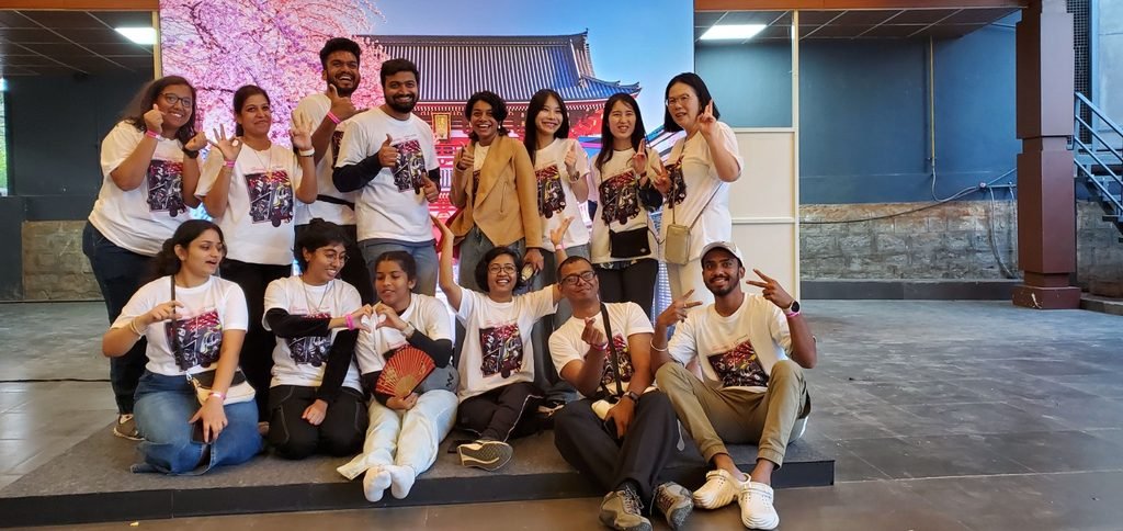 Ananya Mukesh (sitting 2nd from left) with Volunteers at Japan Habba organised at Bengaluru in January 2025